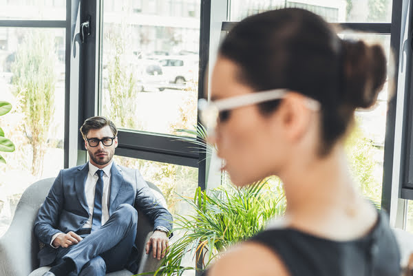 man staring at woman