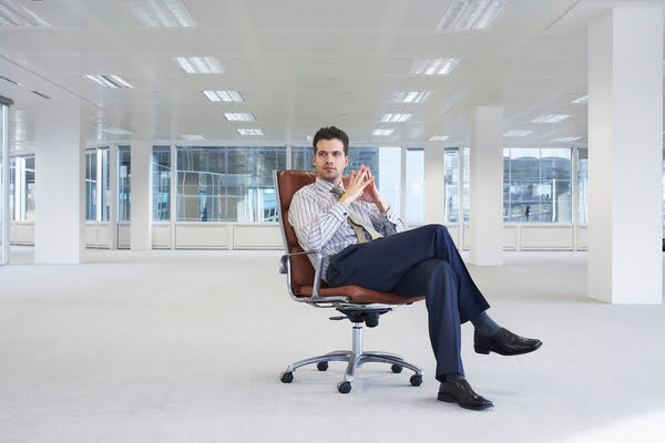 confident man with crossed legs